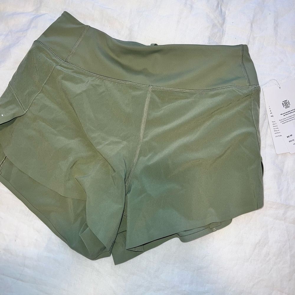 Green 3.5” Run With It Athleta Shorts